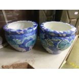 A pair of blue and white floral decorate