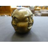 A medium four-faced Buddha head