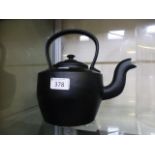 A cast iron kettle