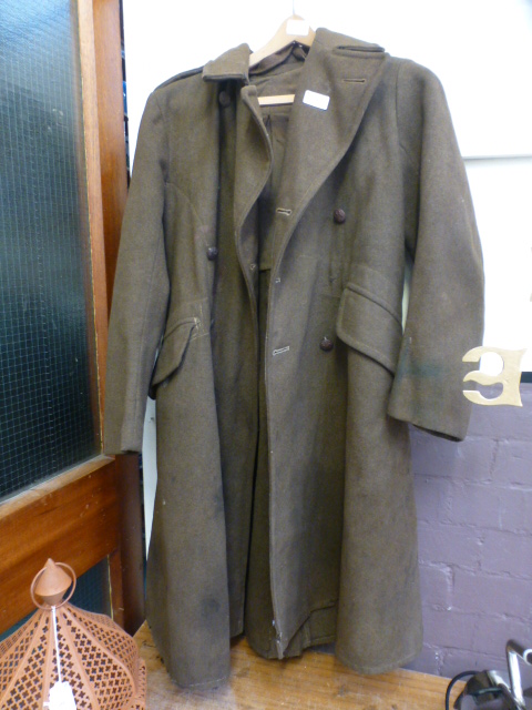 A military overcoat in a dark green fabr