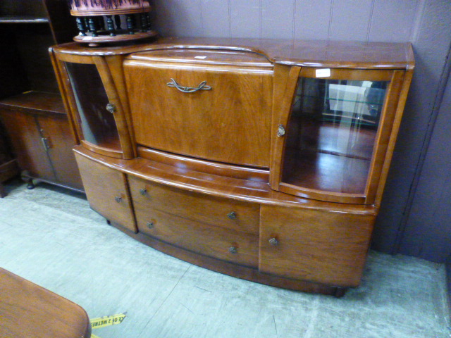 An early 20th century walnut side cabine