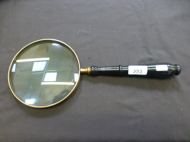 A silver plated 6'' magnifying glass