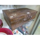 A small old steel suitcase