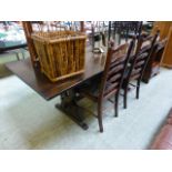 A mid-20th century oak drawer leaf table