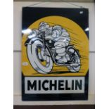 A large metal sign 'Michelin'