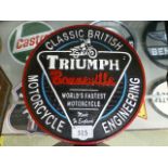 A large Triumph Bonneville sign