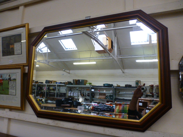 A mahogany framed bevel glass mirror