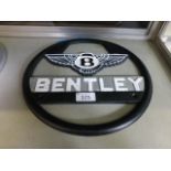 A large Bentley sign