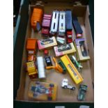 A tray containing die cast vehicles to i
