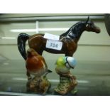 A Beswick model of a horse together with