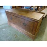 An early 20th century oak wardrobe base