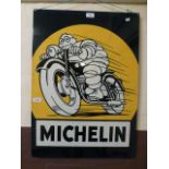 A large metal sign 'Michelin'