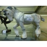 A large Beswick model of a draft horse