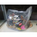 A bag containing an assortment of costum