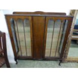 An early 20th century oak display cabine