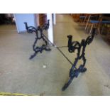 A cast iron black painted table base