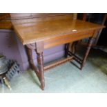 An Edwardian walnut side table, the top