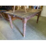 A 19th century pine kitchen table with s