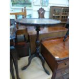 A reproduction mahogany wine table