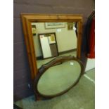 A pine framed rectangular mirror along w