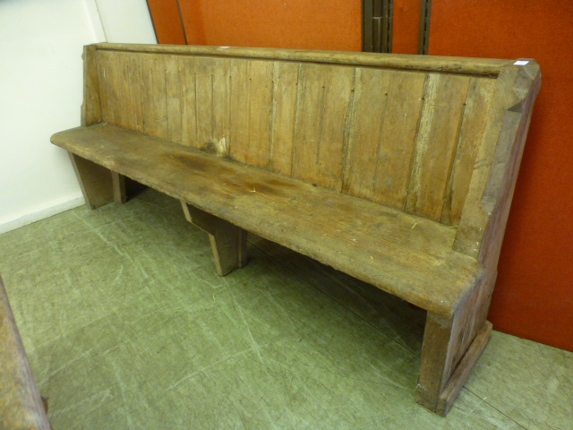 A 19th century pine pew with stop chamfe