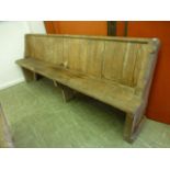 A 19th century pine pew with stop chamfe