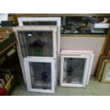 A selection of framed stained glass