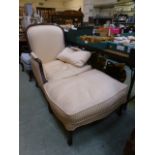 A French style armchair upholstered in a