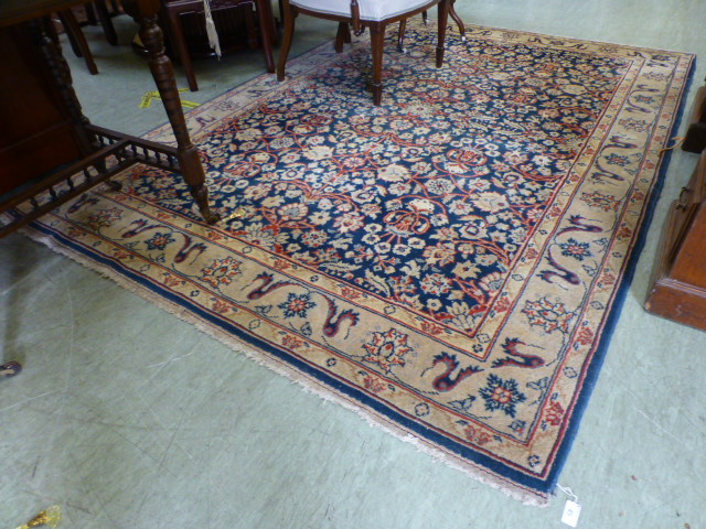 A hand woven Persian rug, the triple lin