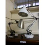 Two angle poise style lamps