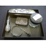 A selection of silver and white metal it