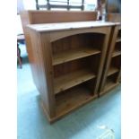 A modern pine open bookcase