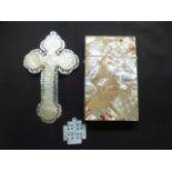 A mother of pearl card case together wit