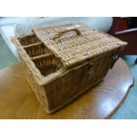 A wicker picnic basket