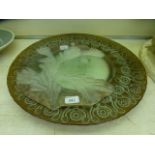 A large moulded glass charger together w