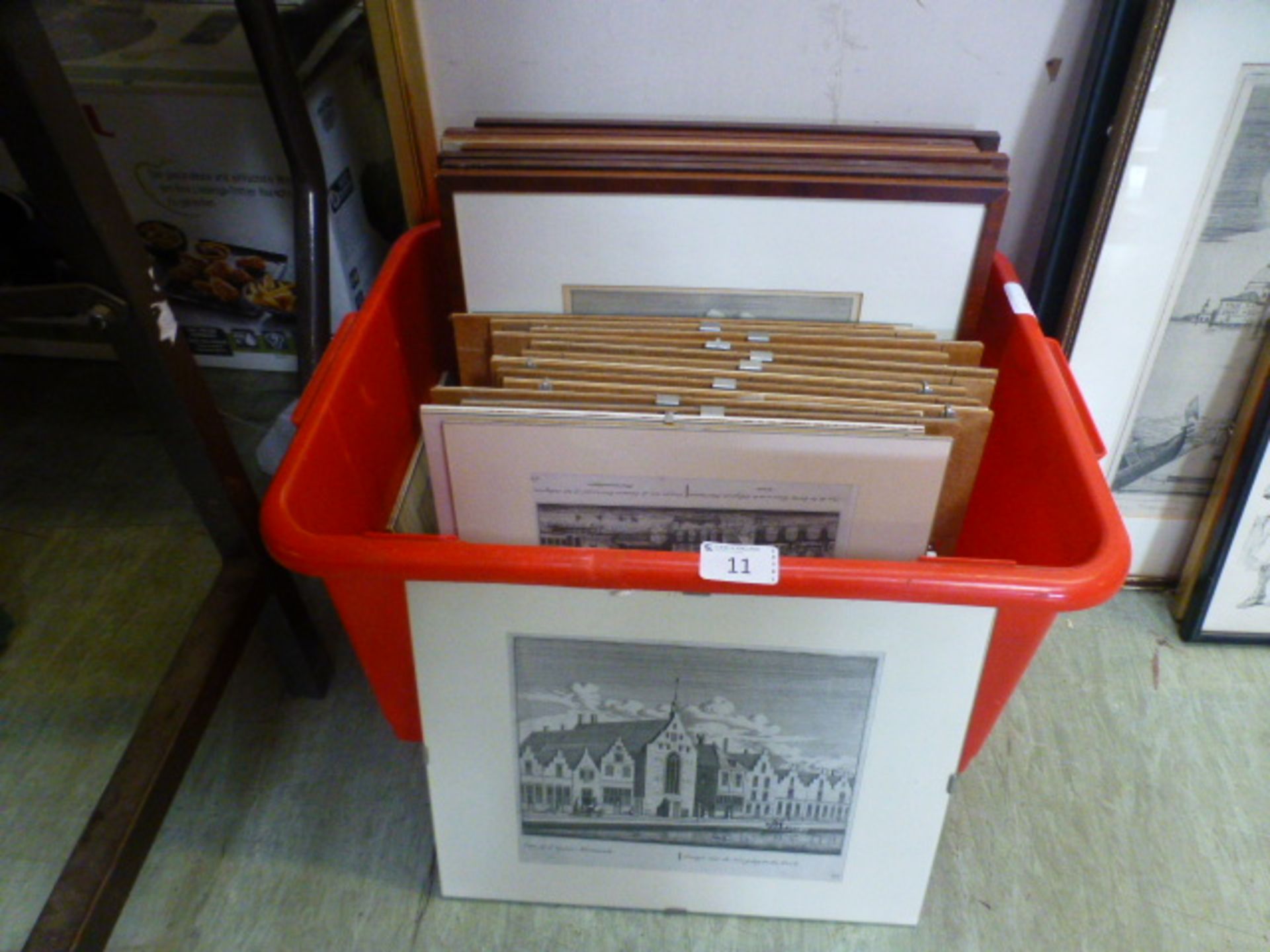 A box containing a quantity of prints, m