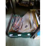 A small box of assorted LPs and 45s by v