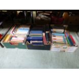 Three trays of hardback books by various