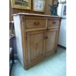 A 19th century pine cabinet, the top ove