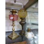 A 19th century brass columned oil lamp h