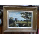 A framed oil on board of countryside sce