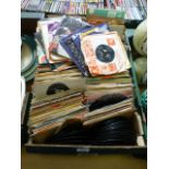 A tray of 45 RPM records by various arti