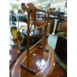 An Edwardian beech towel rail