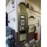 A gilt framed mirror