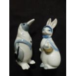 Two Wade whimsies, one of a penguin, the