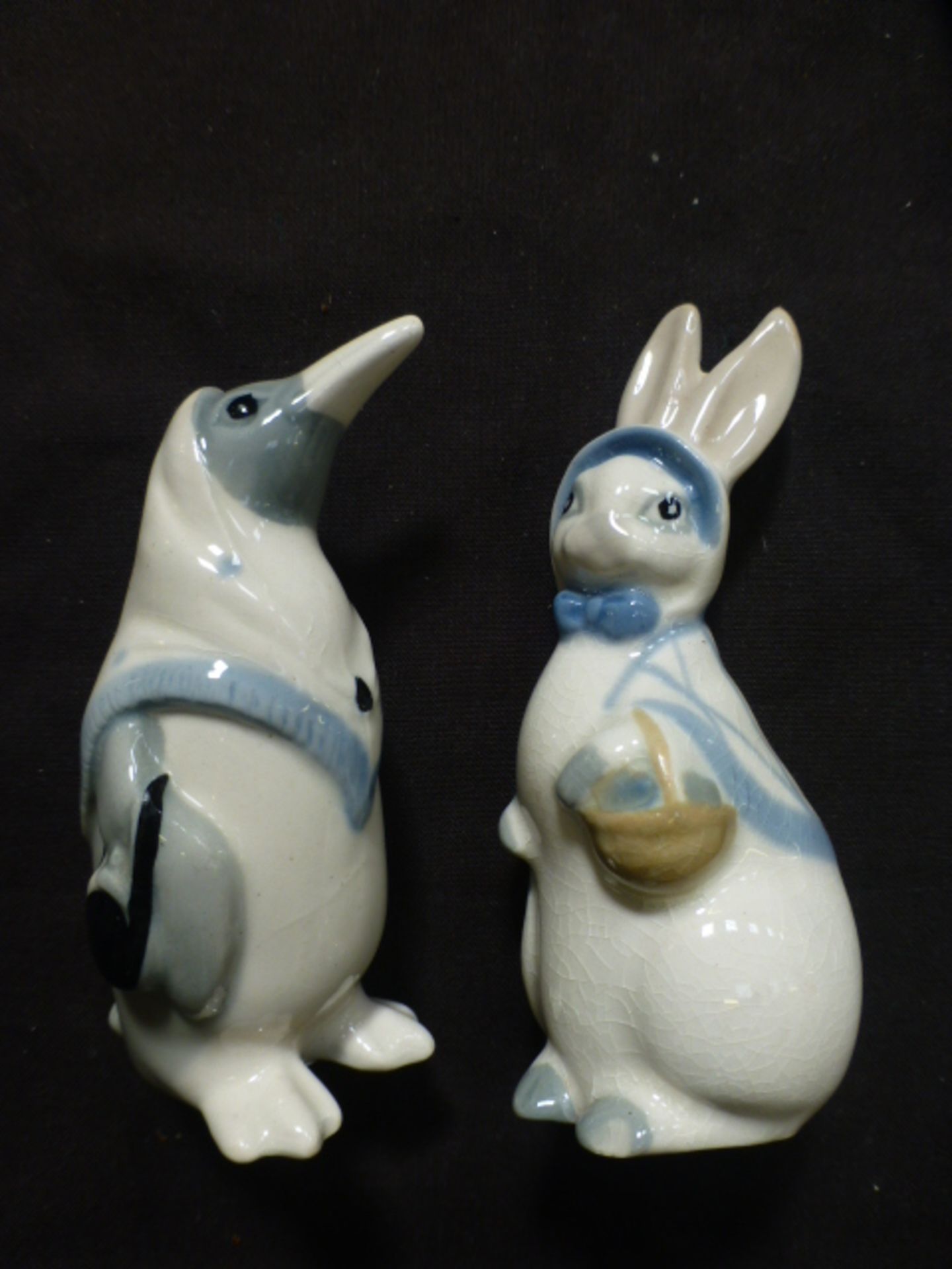 Two Wade whimsies, one of a penguin, the