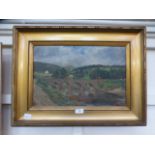 A gilt framed oil on board of river thou