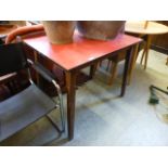 A mid-20th century red Formica topped ki