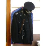 An obsolete policeman's uniform, hat, ja