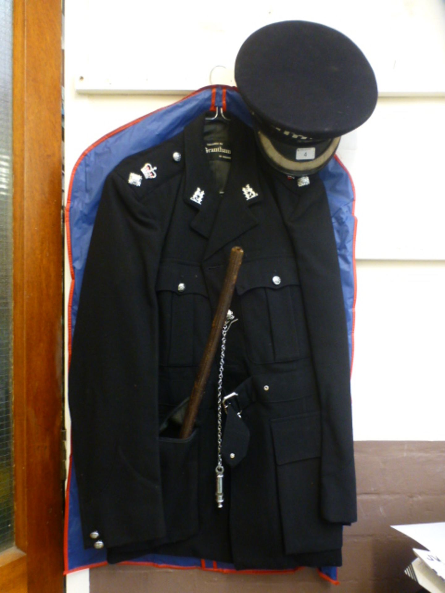 An obsolete policeman's uniform, hat, ja